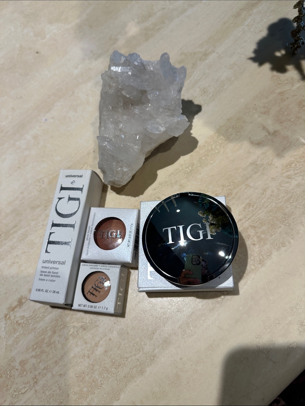 TIGI Black Compact with Metallic Bronze and Champagne Accents